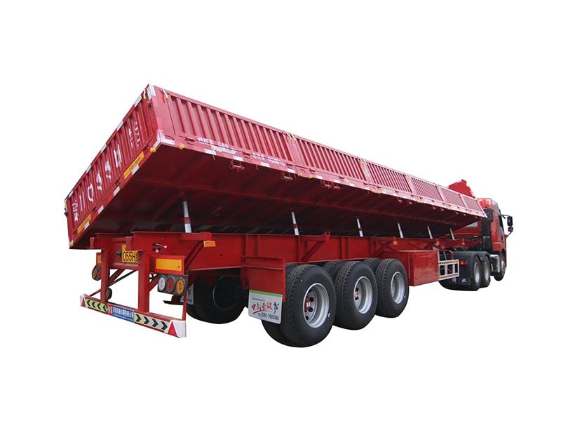 Side tipping dump truck